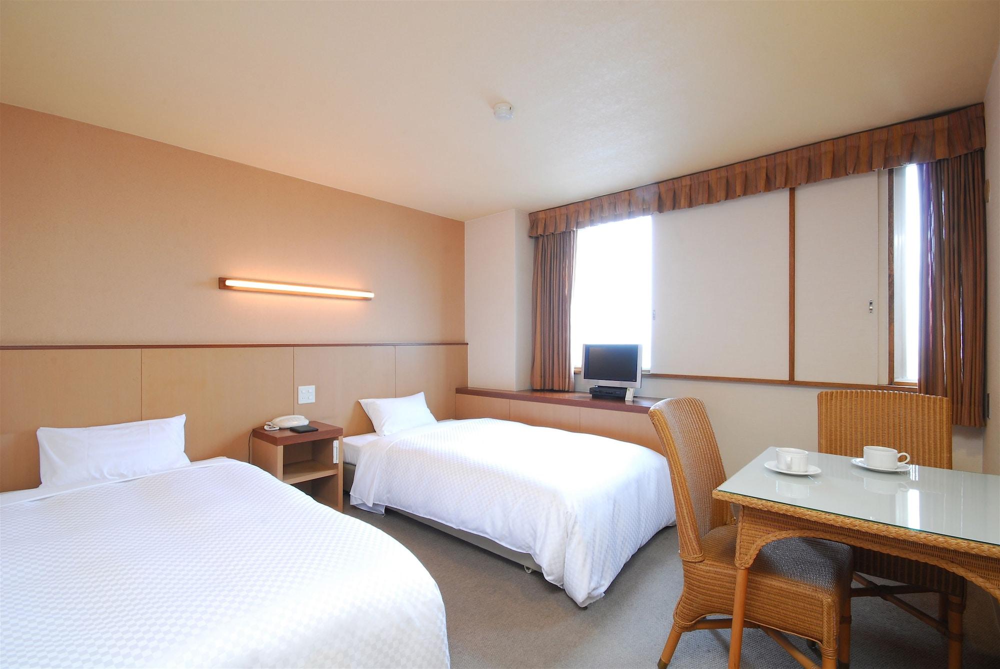 Sunsky Hotel Kitakyushu Bagian luar foto