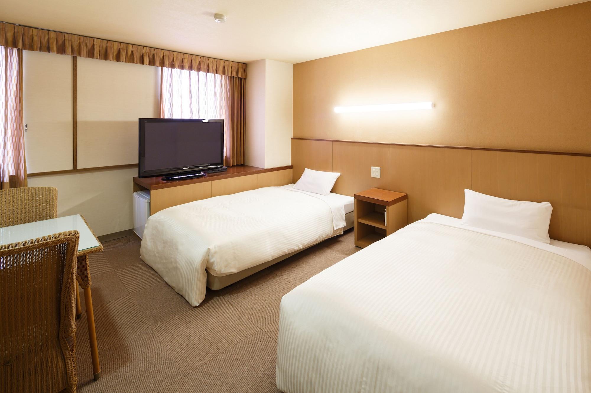 Sunsky Hotel Kitakyushu Bagian luar foto