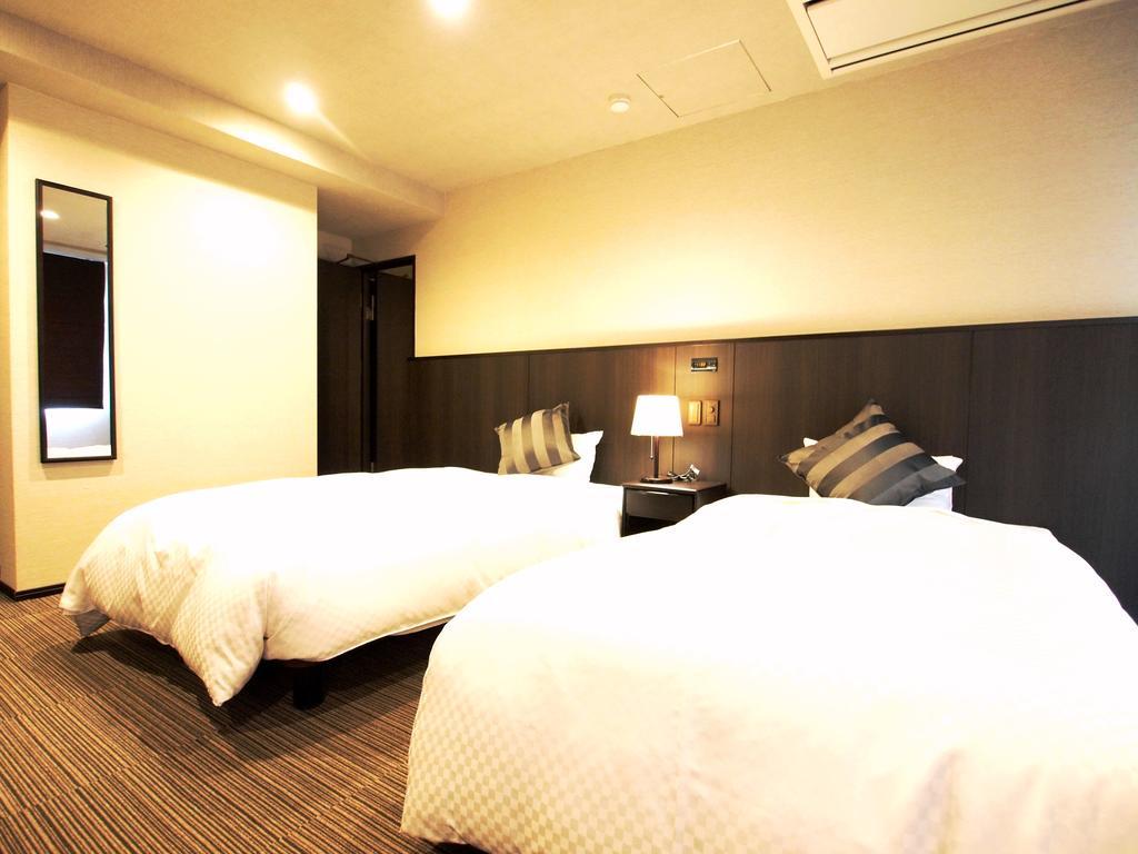 Sunsky Hotel Kitakyushu Bagian luar foto