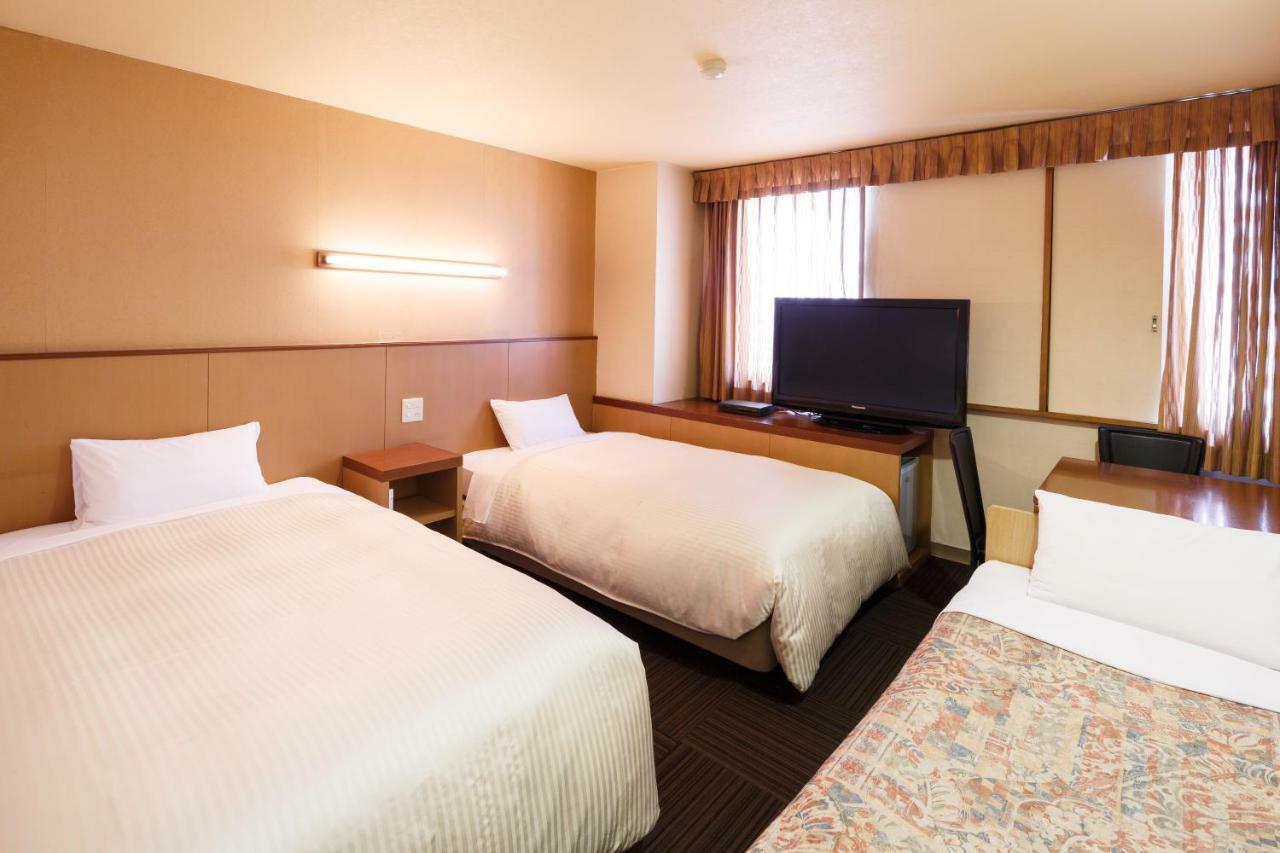 Sunsky Hotel Kitakyushu Bagian luar foto