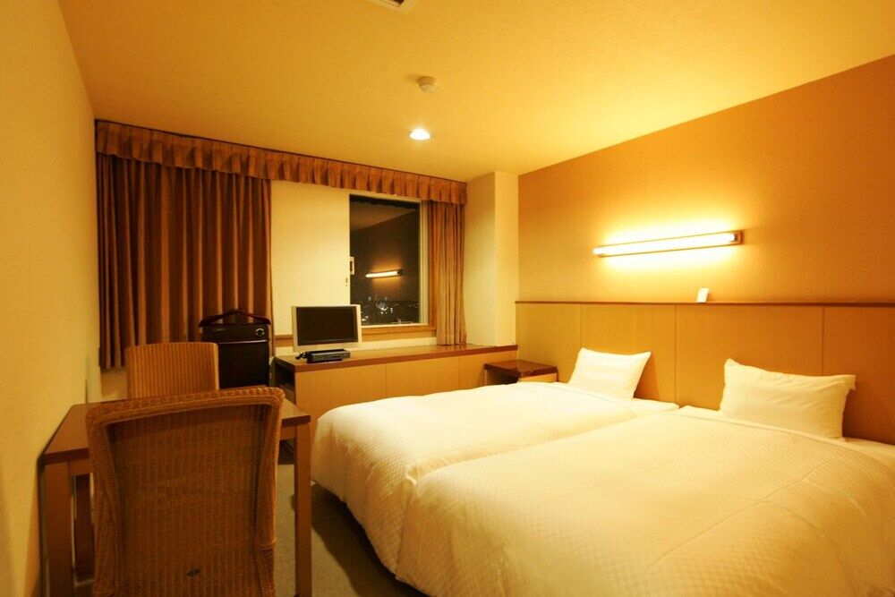 Sunsky Hotel Kitakyushu Bagian luar foto